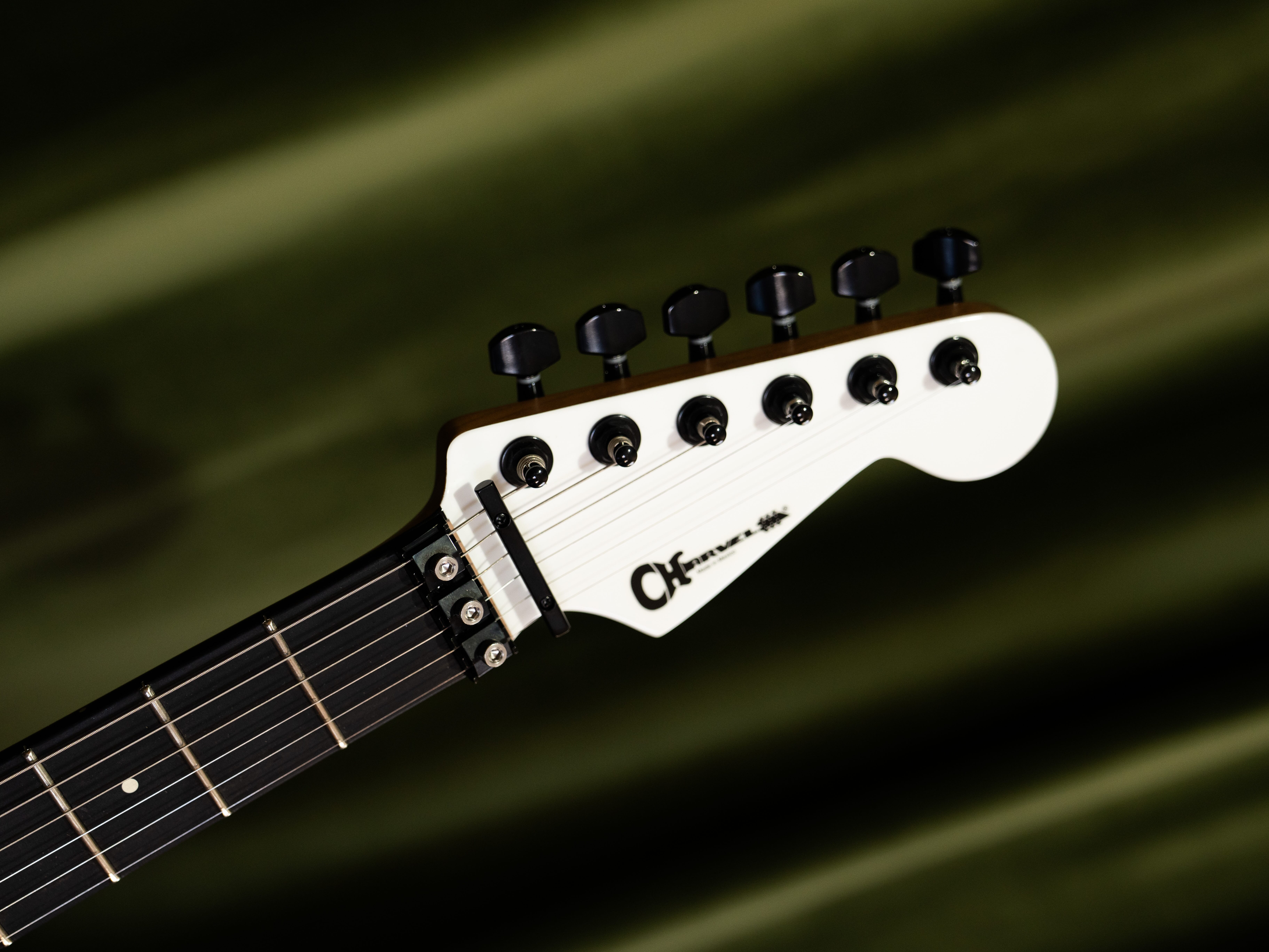 Charvel Pro-Mod Plus DK24 headstock with ebony fingerboard and locking tuners